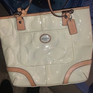 Women Coach Tan and brown purse